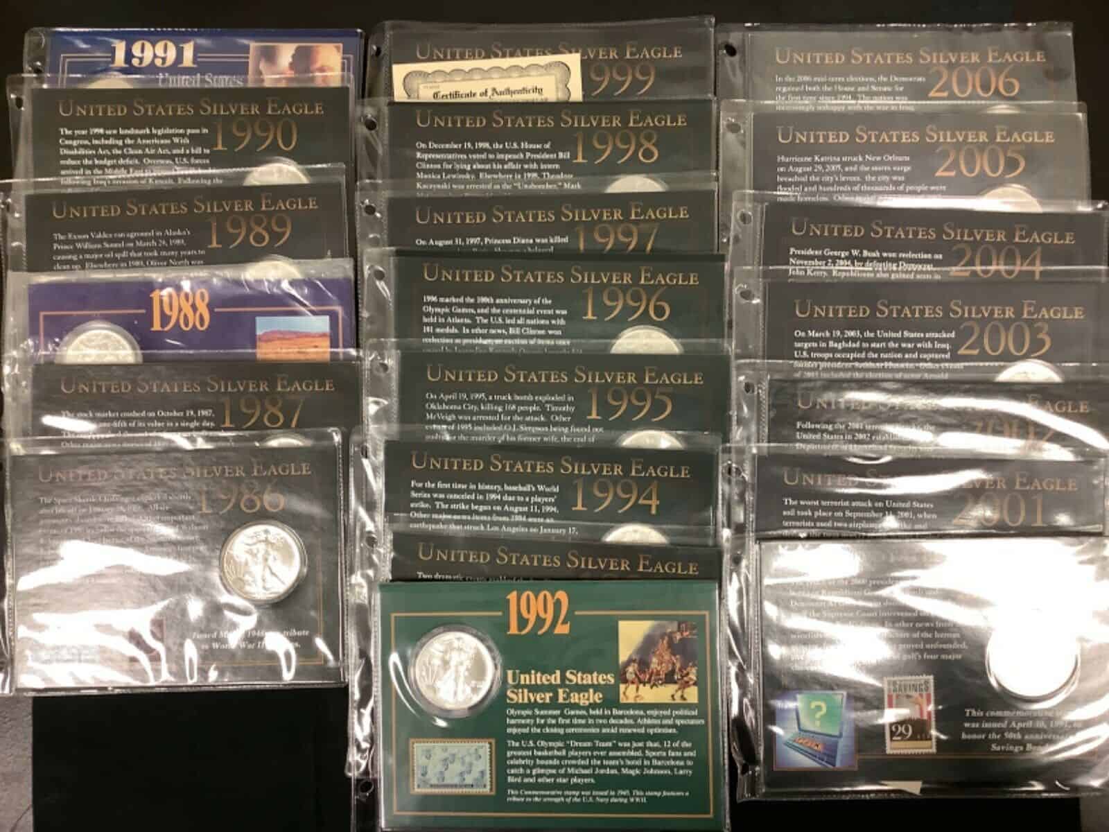 Lot of (21) 1986-2006 Silver Eagle Dollars with USPS Stamps A74.600